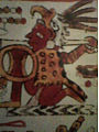 Un guerrero mixteco vistiendo una piel de jaguar y un yelmo en forma de cabeza de águila calva. Códice Selden, p. 17.