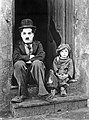 Charlie Chaplin and Jackie Coogan in The Kid