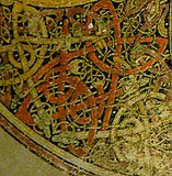 Detail of the interlacing and zoomorphic decoration of a Chi-Rho in the Book of Kells