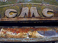 Grill detail of a rusted tow truck