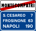 End of urban area, with distances to other towns (end of 50 km/h speed limit and of the prohibition of using horn)