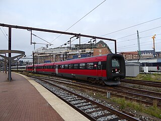 Red IC3 51 at at Copenhagen Central station.