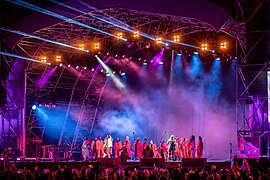 Ntantu and Leeds Gospel Choir perform on stage at The Awakening. LEEDS 2023.jpg