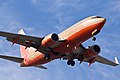 Boeing 737-700 N717SA in older livery.