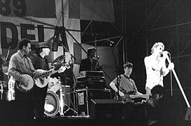 Jem Finer, Terry Woods, Darryl Hunt et Shane Mac Gowan