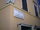 Historic marble street sign in Rome, Italy