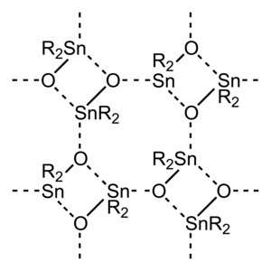 Estructura de l'òxid de diorganoestany, destacant l'extens enllaç intermolecular.