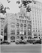 Sign, "Welcome Home From the Crow-Eaters," on the front of the Washington Post Building in Washington, DC. President... - NARA - 199955.jpg