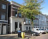 Woonhuis met zijvleugel. Deze zijvleugel zonder eigen ingang is toegankelijk via het woonhuis