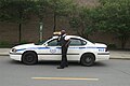 Polis Keselamatan kenderaan polis dan pegawai keselamatan polis di Montreal, Quebec, Kanada.