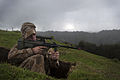 New Zealand Defence Force soldier denoting opposing force status by wearing Desert Disruptive Pattern Material (DPM) in a temperate environment.