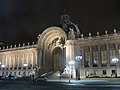 View of the façade at night from the south