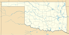 Mapa konturowa Oklahomy, po prawej znajduje się punkt z opisem „Wewoka”