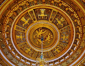 Center of the bedroom ceiling, carved by Guillaume Noyers (1644)