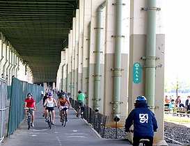 Separated by running underneath a motorway