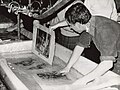 Manuscripts from the National Library being washed and dried