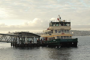 Cremorne Point Ferry Wharf being visited by a ferry.