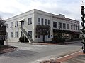 Cherry St 2 story building across from post office