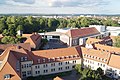 Blick vom Turm der alten Johanneskirche auf den Schlossplatz 2017, v. l. n. r.: Wasserturm, Kanzleibau, CPH, Marstall/Stadthalle, Karl-Rehbein-Schule