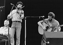 O'Connor (centre) with "Skylark" on stage at the 1989 Port Fairy Folk Festival, Australia