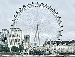 London Eye seen from the east across Thames River in July 2024