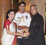 The President, Shri Pranab Mukherjee presenting the Padma Bhushan Award to Dr. Saroja Vaidyanathan, at an Investiture Ceremony-II, at Rashtrapati Bhavan, in New Delhi on April 20, 2013.jpg