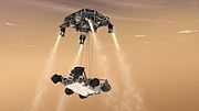 Lądowanie Curiosity. Widoczny jest żuraw (sky crane) opuszczający łazik
