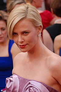 A photograph of Theron on the red carpet at the 82d Academy Awards in 2010