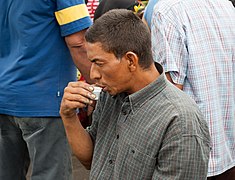 Coffee drinking vegetable seller.jpg