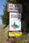 Panneau d'entrée du village.