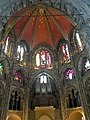 Early Gothic and an advanced Gothic window, behind the organ