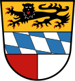 Landkreis Wertingen (–1972) Zweimal geteilt und unten gespalten; oben in Gold ein schreitender, herschauender, rot bewehrter schwarzer Löwe, in der Mitte die bayerischen Rauten, unten Rot und Silber.