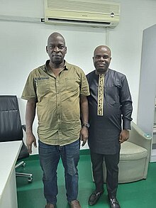 kyuka Lilymjok and his student at his UBEC office, International Conference Center, Abuja in 2023.