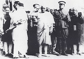Subhas Bose (in military uniform) with Congress president, Motilal Nehru taking the salute. Annual meeting, Indian National Congress, 29 December 1928