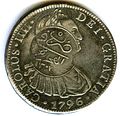 Anverso de moneda de 8 reales de Carlos IV de 1796 con resello de Sudán.