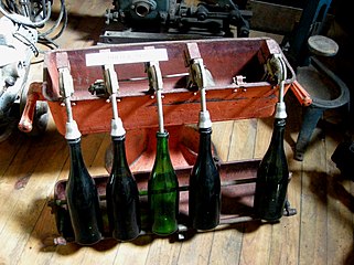 Old taps for filling cider bottles in France