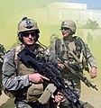 Michael A. Monsoor (†2006), US Navy SEAL in Ramadi, Iraq with a M249