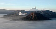 Thumbnail for File:Mount Bromo at sunrise, showing its volcanoes and Mount Semeru (background).jpg