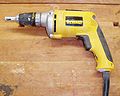 A DeWalt screw gun, used for countersinking drywall screws.