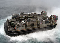 A U.S. Navy LCAC hovercraft attached to the Amphibious assault ship USS Kearsarge