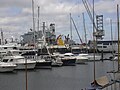 Harbour, with naval vessel in background