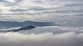 Georgenberg mit Blick über das Wolkenmeer im Tal zum Albtrauf der Schwäbischen Alb