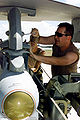 AGM-65 Maverick missiles is being loaded onto an F-16