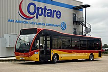Optare生产的Versa巴士在挂有公司标志的厂房前