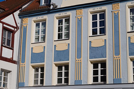 Yellow and blue front painting on old house, Fuerth, Germany