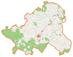 Mapa konturowa powiatu szydłowieckiego, blisko centrum na dole znajduje się punkt z opisem „Zakład Elektroniki Przemysłowej „Profel” sp. z o.o.”