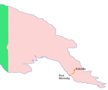 Colour map depicting the location of the Kokoda Track within New Guinea. The country is wide in the west, on the left of the map and narrows to a peninsula in the east on the right of the map. The Kokoda Track stretches north to south from Port Moresby on the southern cost to the village of Kokoda