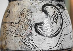 Peltaste loitando contra unha pantera ; inscrición: kalos . Lado A dunha copa do ático con fondo branco, deb. Louvre