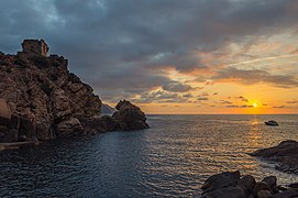 The Genoese tower of Porto in sunset