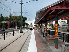 A train departing the side platform of North Killingsworth station